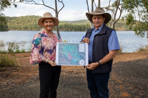 Cr Rutherford and Mayor Williams with map of proposed fossicking area in Mount Morgan